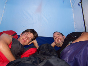 Chris, Darcy and Sarah's feet in a sleeping bag pose in our cozy accommodations